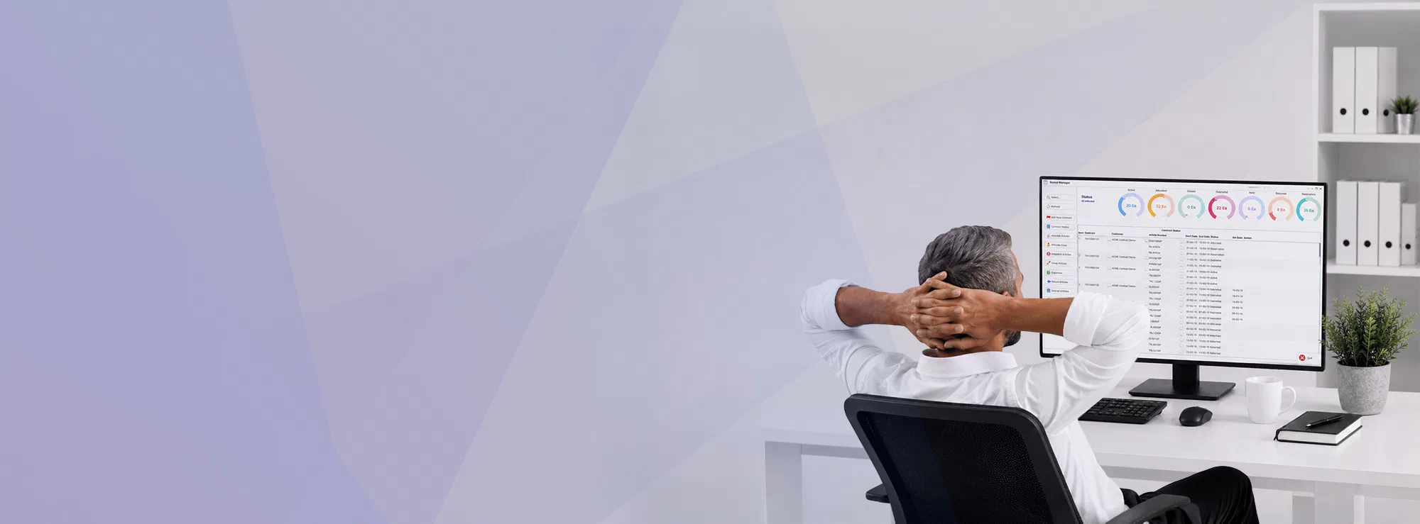 Business leader at his desk with operations running live on the Embrace ERP dashboard